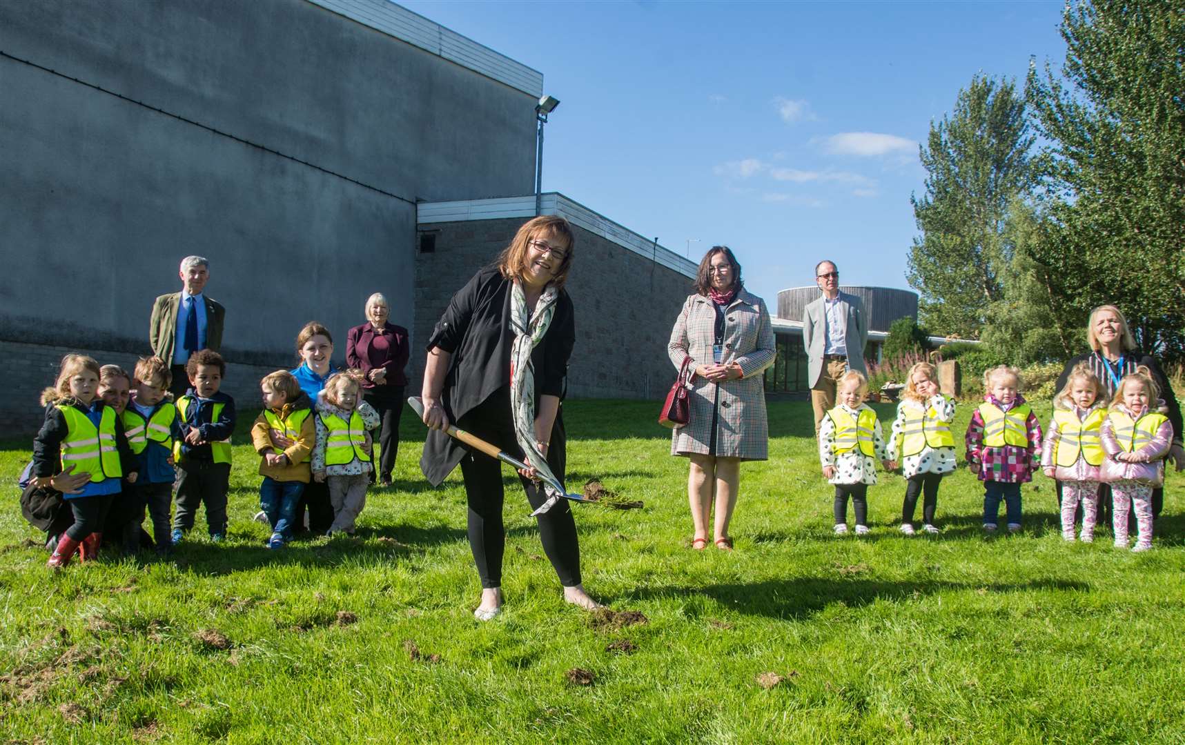 Cllr Sonya Warren, Chair of the Children and Young Peopleâs Services Committee (front) cuts the first turf for the new nursery building in Keith. ..Joining her are (from back left) Cllr Donald Gatt, Cllr Teresa Coull, Cllr Laura Powell and Project manager for ELC expansion Robin Paterson and Eleanor Smith (kneeling right) Nursery Manager for Flexible Childcare Services...Picture: Becky Saunderson..