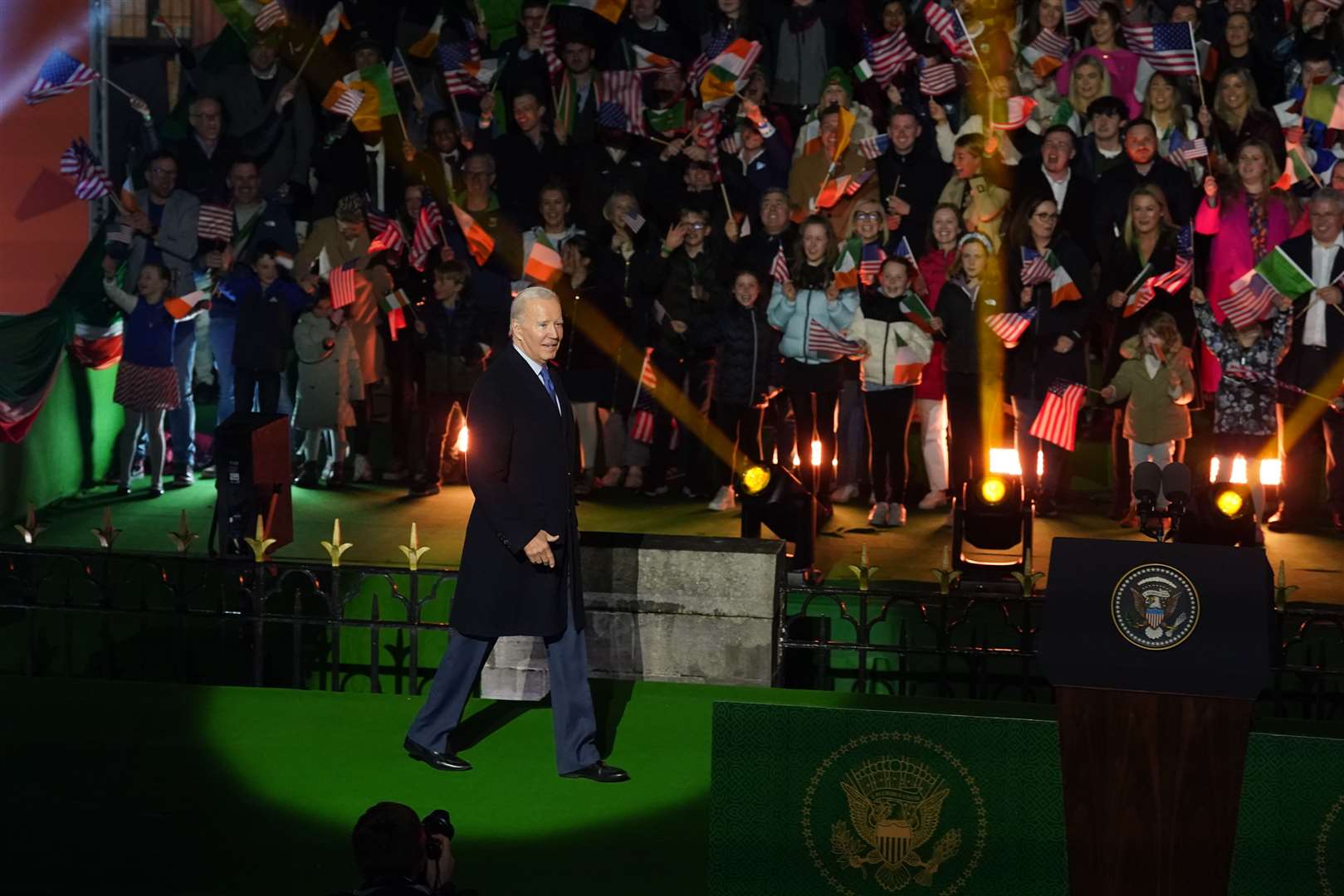 US president Joe Biden walks on stage in Ballina (Brian Lawless/PA)