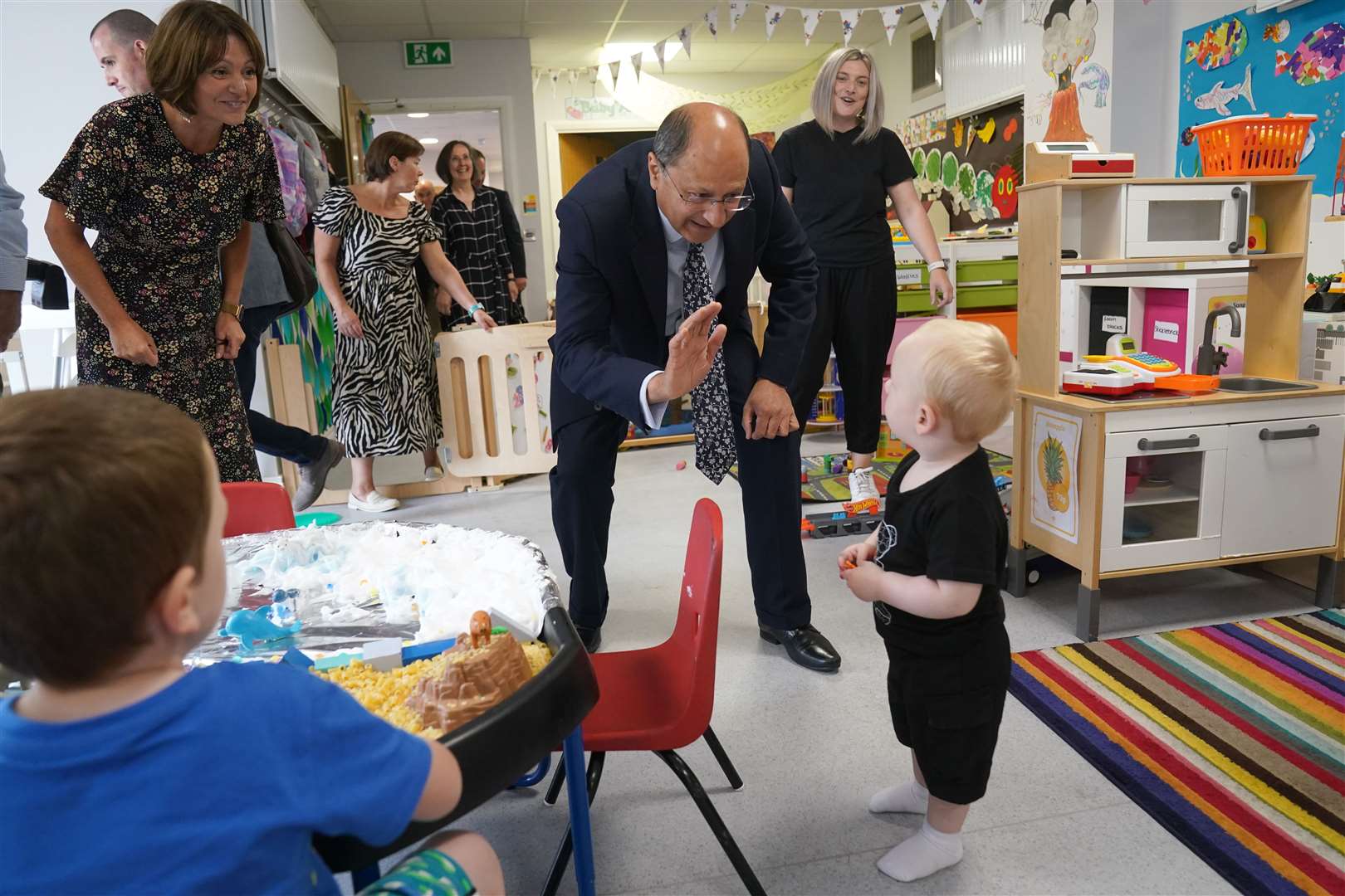 Northern Ireland Secretary Shailesh Vara meeting one-year-old Kobi Flanagan at a creche during a visit to Atlas Women’s Centre, Lisburn, Co Antrim (Brian Lawless/PA)