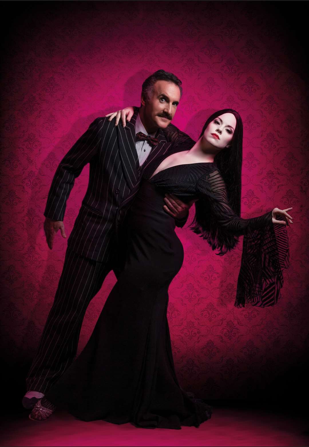 Cameron Blakely as Gomez and Joanne Clifton as Morticia