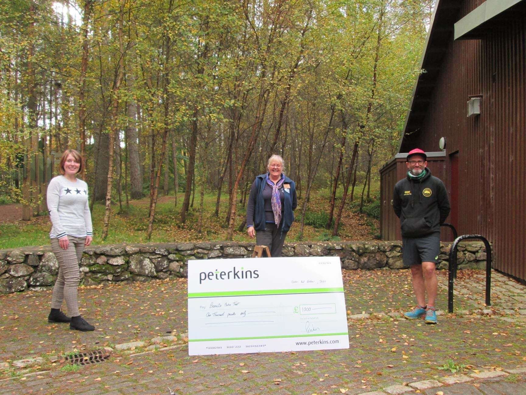 Karen Simpson from the Peterkins Charitable Foundation (left) with Jan Lythgoe, Bennachie Centre warden and Rod Wallace from the Bennachie Ultra Marathon.
