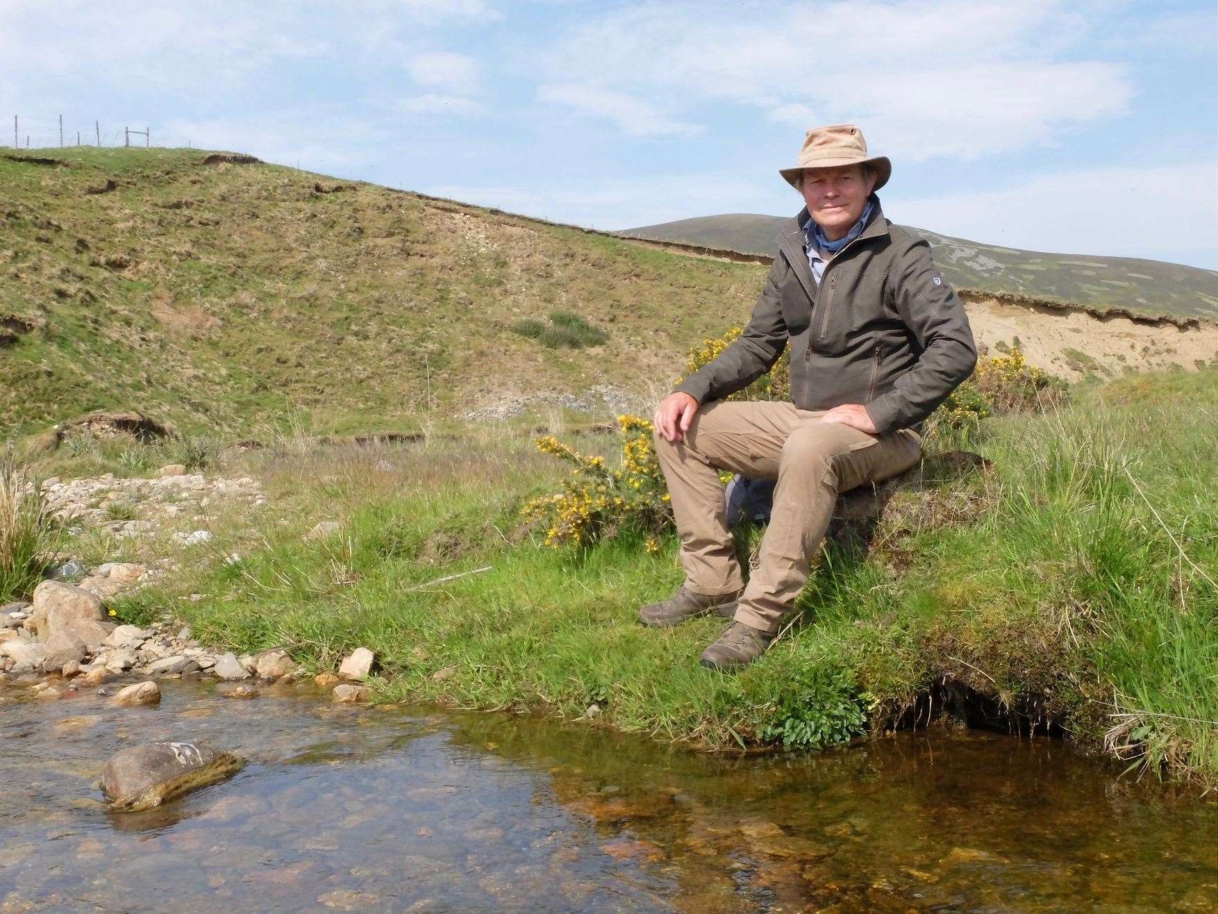 Grand Tours of Scotland's Rivers sees,Paul Murton near the start of the River Don.