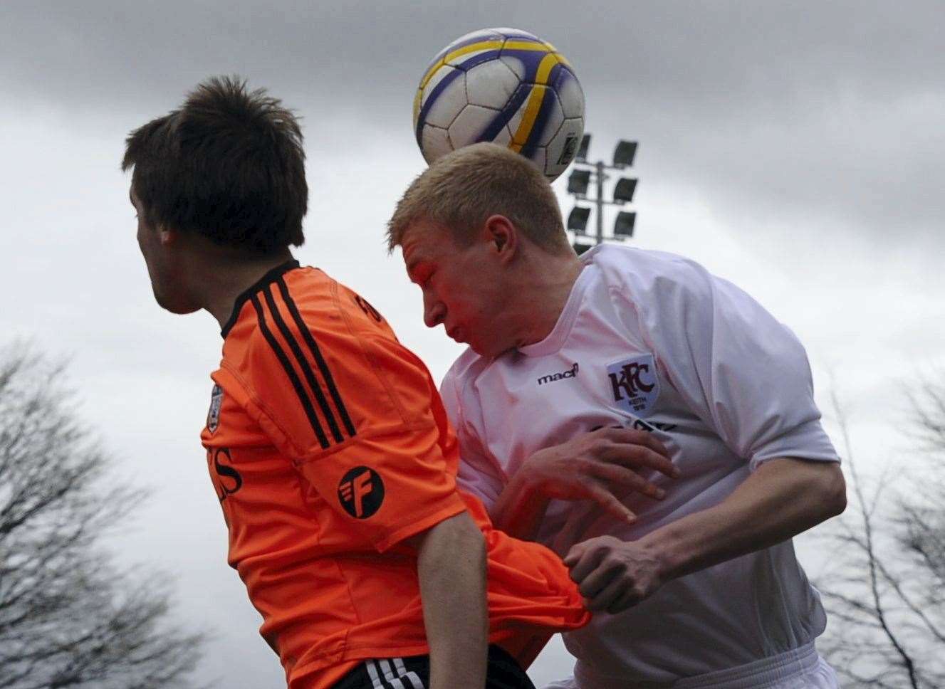 Battling to win a header for Keith in 2013 is Stewart Hutcheon (right).