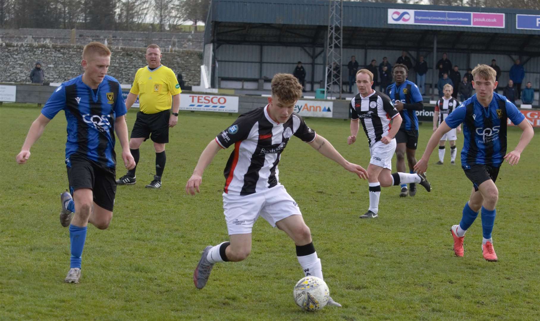 Huntly close down a Wick attack. Photo: Derek Lowe