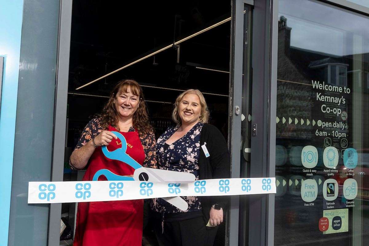 Store manager Jemma Wilson and Suzanne Bunton from charity Loaves and Fishes who opened the new store on Friday.