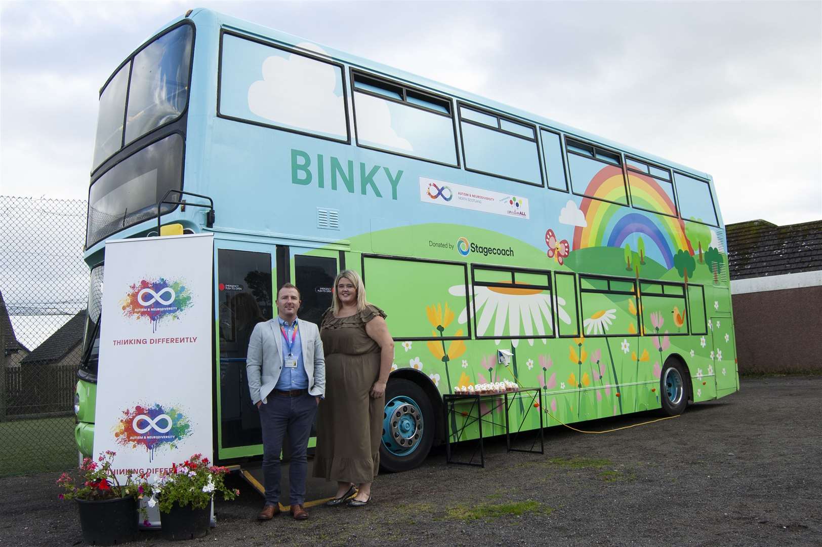 A-ND CEO Billy Alexander and Services Manager for Binky and Outreach Support Francesca Read alongside Binky the Sensory Bus.