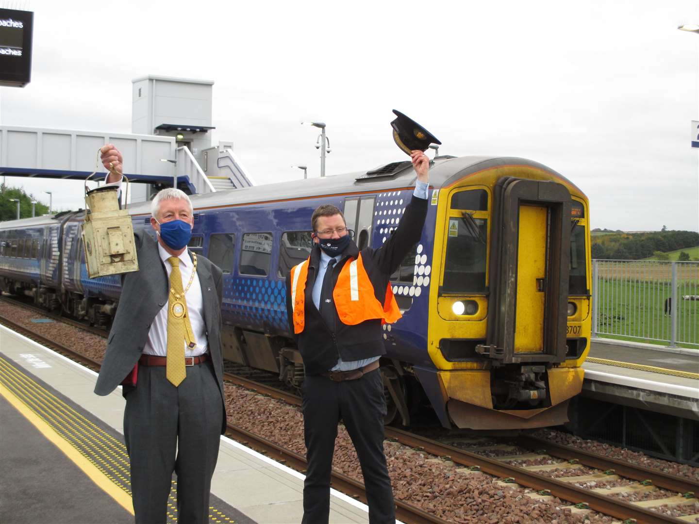 Provost Bill Howatson and the council's strategic transport officer Robert McGregor welcome back trains to Kintore.