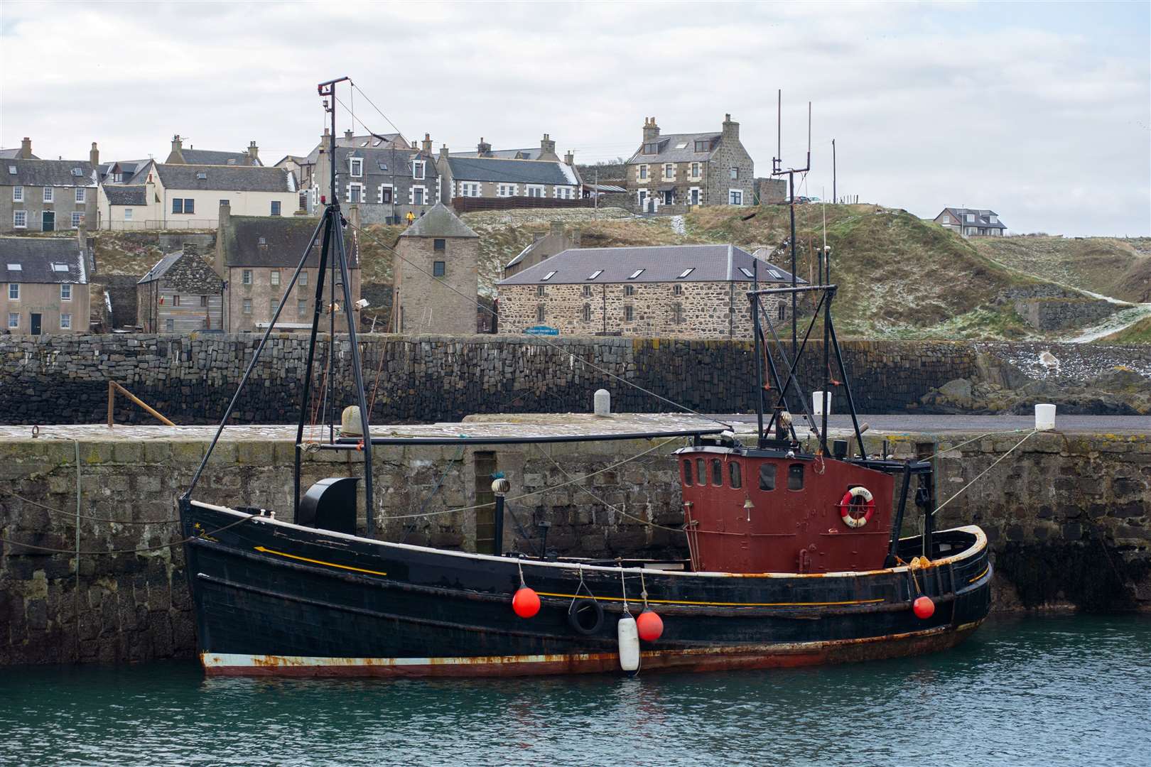 Portsoy's harbour ahead of filming on the sixth season of Peaky Blinders. Picture: Daniel Forsyth.
