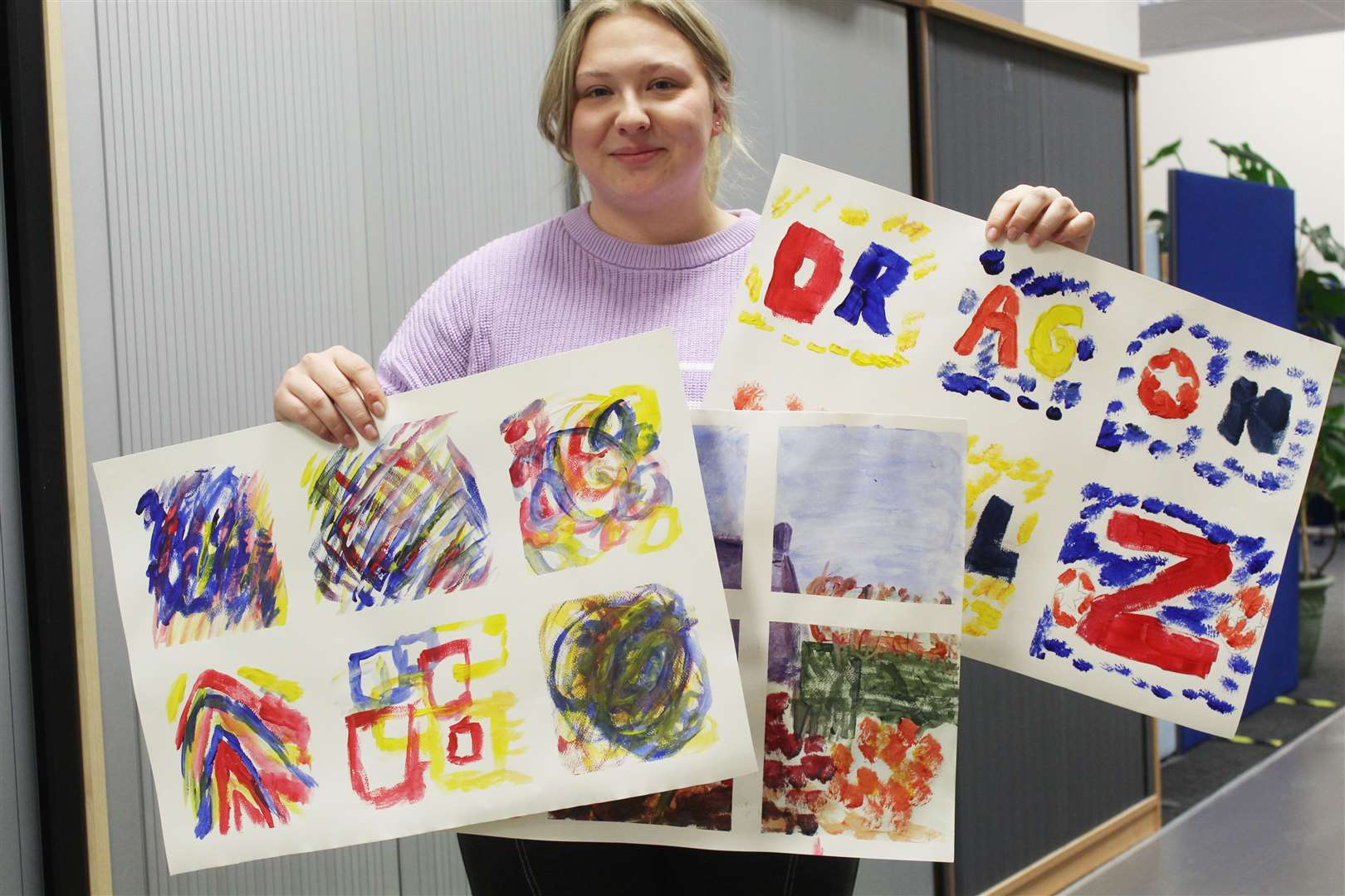 Tutor Millie Farmer shows off some of the art sketches produced by students at an acrylic session at GO, West High Street, Inverurie Picture: Griselda McGregor