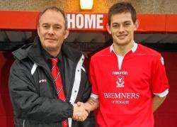 Deveronvale boss Charlie Charlesworth welcomes his son, former Lossiemouth midfielder Colin, to Princess Royal Park before Saturday’s Highland League win over Strathspey Thistle. (IM)
