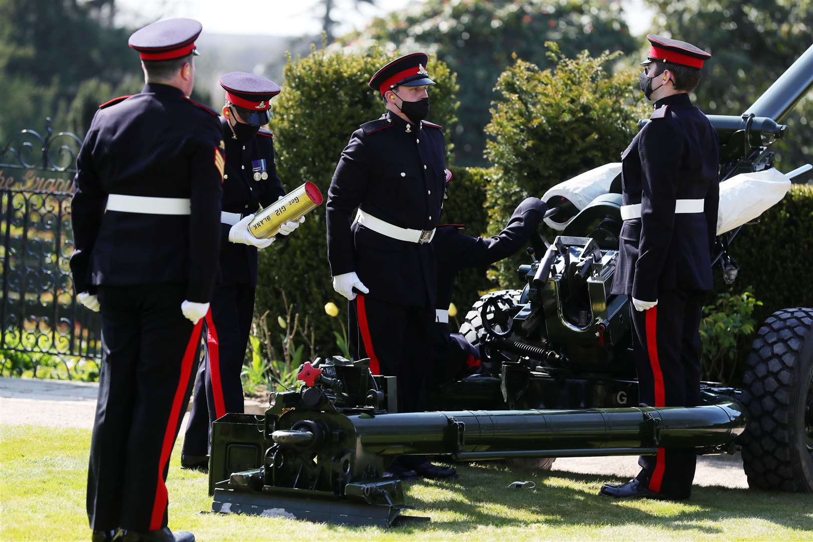 Personnel from 206 (Ulster) Battery Royal Artillery conduct a gun salute at Hillsborough Castle, Co Down (Kelvin Boyes/Press Eye/PA Wire)