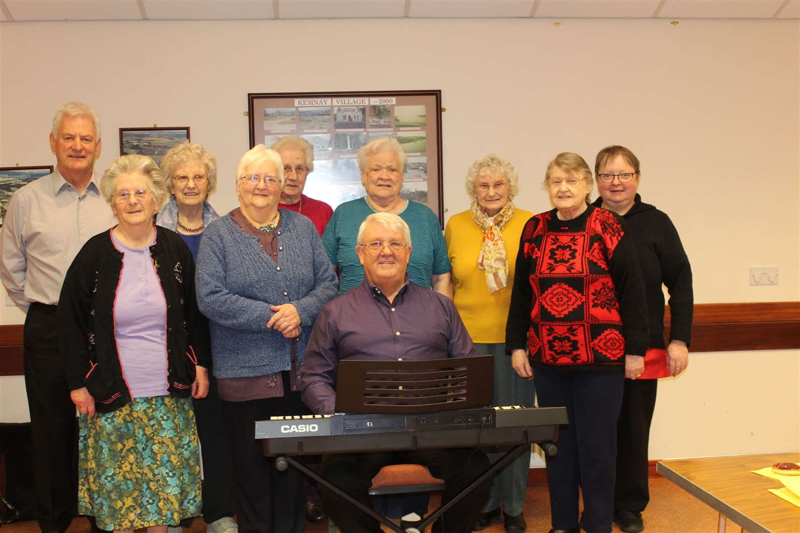 Entertainers Ian Booth (back left) and Ian Dow (on keyboard) delighted their audience at Tuesday centre's meeting this week. Picture: Griselda McGregor