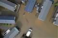 More heavy rain on way as dozens of people evacuated from flooded holiday park