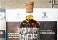 A bottle of Macallan whisky, 1.8 metres high and bottled in Huntly has made a new Guinness World Record