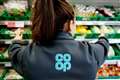 Co-op strikes £600m deal to sell petrol stations to Asda to help boost finances
