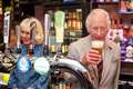 Charles and Camilla pull pints on tour of Welsh valley high street