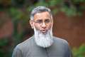 Islamist preacher Anjem Choudary appears in court charged with terror offences