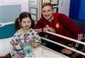 Dons heroes bring festive cheer to young patients at north-east children’s hospital