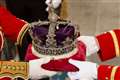 Imperial State Crown and Balmoral and Windsor flowers placed on Queen’s coffin