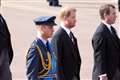 William and Harry side by side as Queen’s loyal staff join procession