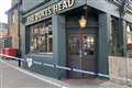 Police arrest man, 20, over machete attack at pub which left three injured