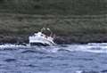 Rescue drama as motor boat runs aground