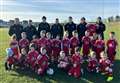 Deveronvale Community Football Club squad supported by fishing vessel