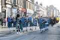 Buckie and District Pipe Band leads the parade of veterans, military personnel and other organisations. Picture: Eric Cormack