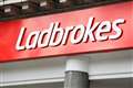 Ladbrokes owner Entain agrees to pay £585m after bribery investigation