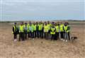 Quensh team supports Newburgh beach clean-up