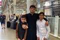 Afghan boy, 11, reunited with twin brother in UK after a year stranded in France
