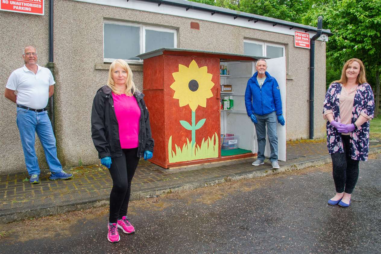 Officially declaring the Portgordon Pantry open for business are volunteers (from left) Paul MacPherson, Ruth Downie, Mick Grant and Lynsday Mayo. Picture: Daniel Forsyth