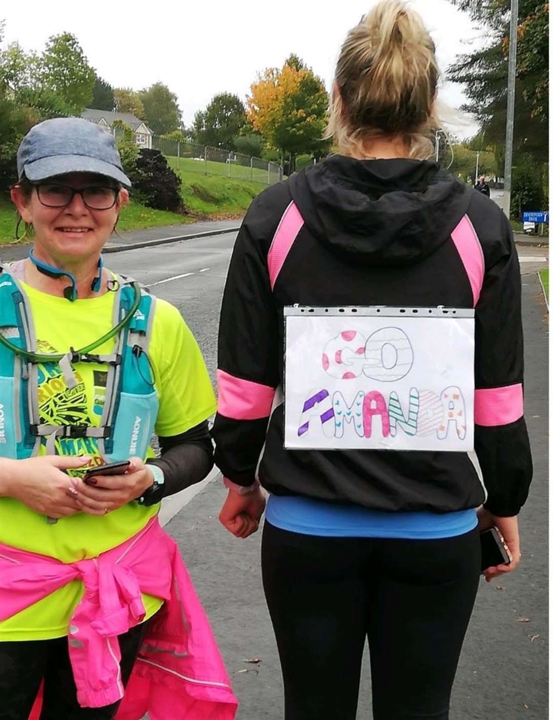 Turriff Running Club's Amanda Anderson (left) was supported along the route of her run.