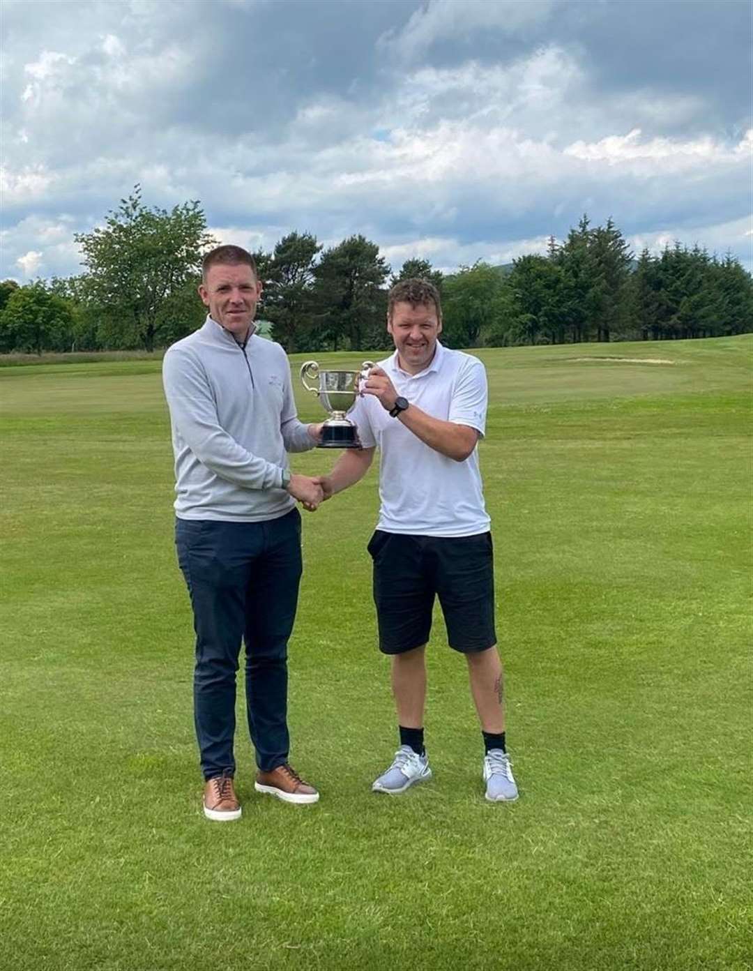 Kyle Mackay, pictured with Keith Golf Club captain Blair Moir, was crowned champion of the Handicap Club Championships.