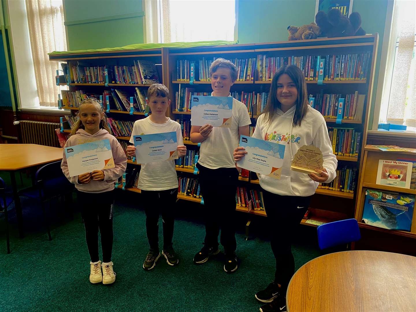 P7 Reading Journey winner Lily-Mae Doyle (right) with highly commended winners Harper Ferguson, Caleb Watt and Callan Paterson.