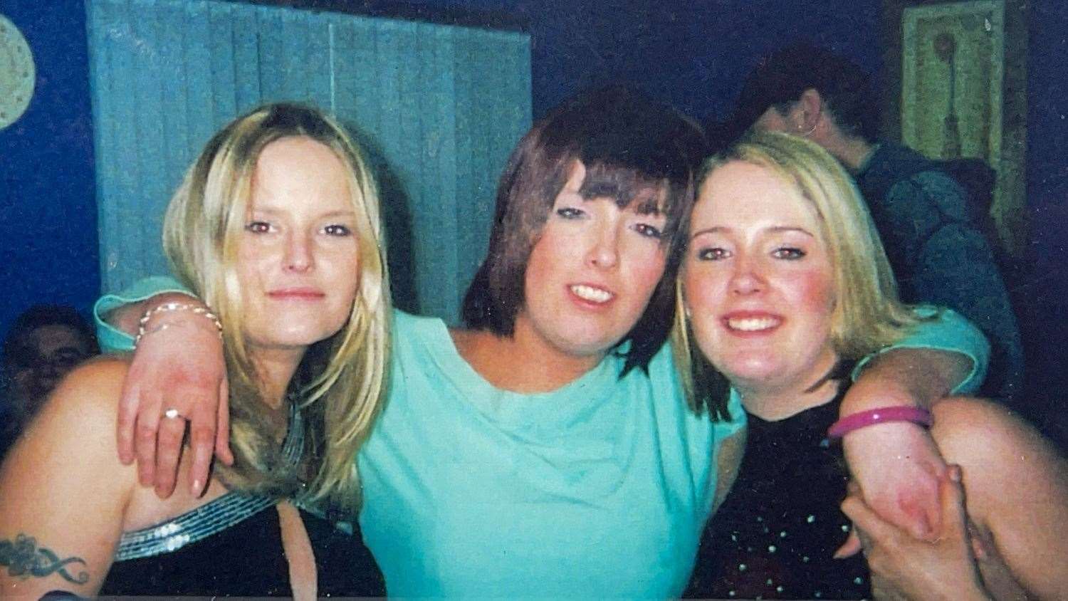 Lisa Dorrian (left) with her sisters Michelle (centre) and Joanne (right) at a house warming party in Bangor, in 2004 (Family Handout/PA)