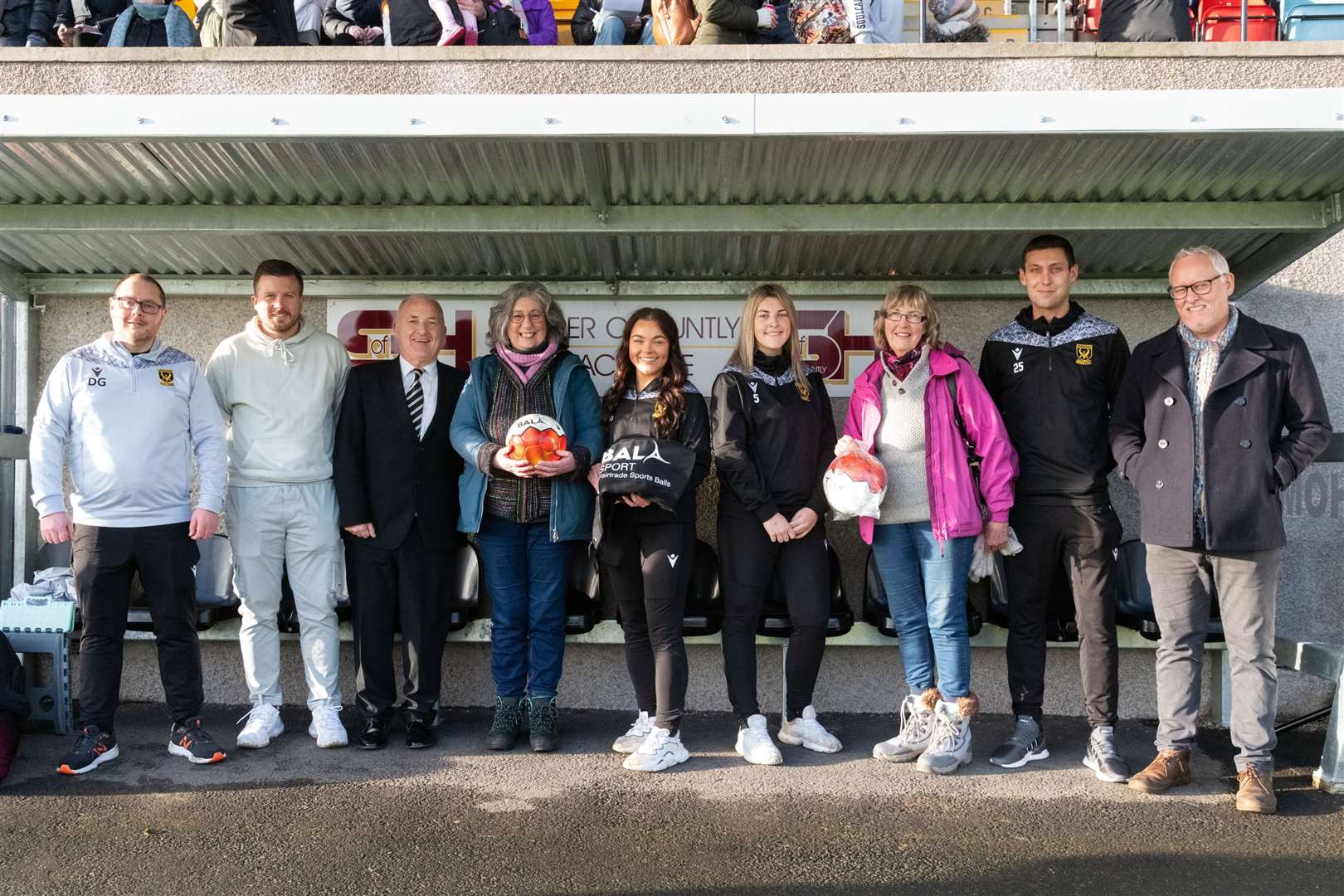 Huntly's Fairtrade Town group handing over Fairtrade footballs to the new Women's team at Christie Park in January. Picture: Beth Taylor