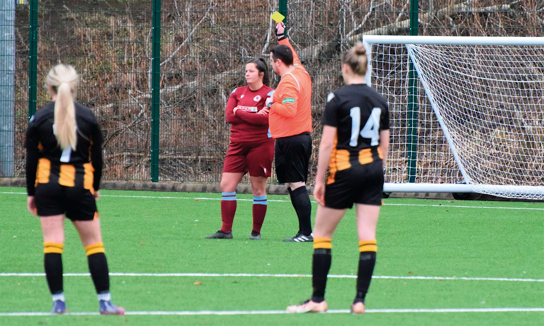 A yellow card is shown to Dryburgh, before red cards were dished out in the second half.