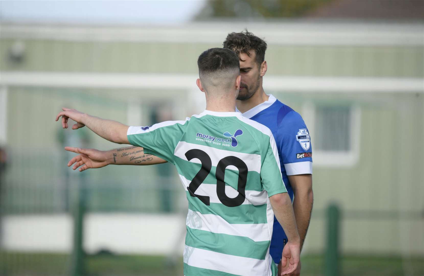 Buckie Thistle's Marcus Goodall and Linfield's Matthew Clarke argue about the award of the opening goal. Picture: Beth Taylor