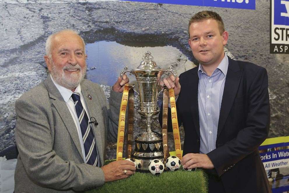 Highland League president George Manson (left) and GPH Builders Merchants managing director Grant Shewan, with the Highland League Cup.