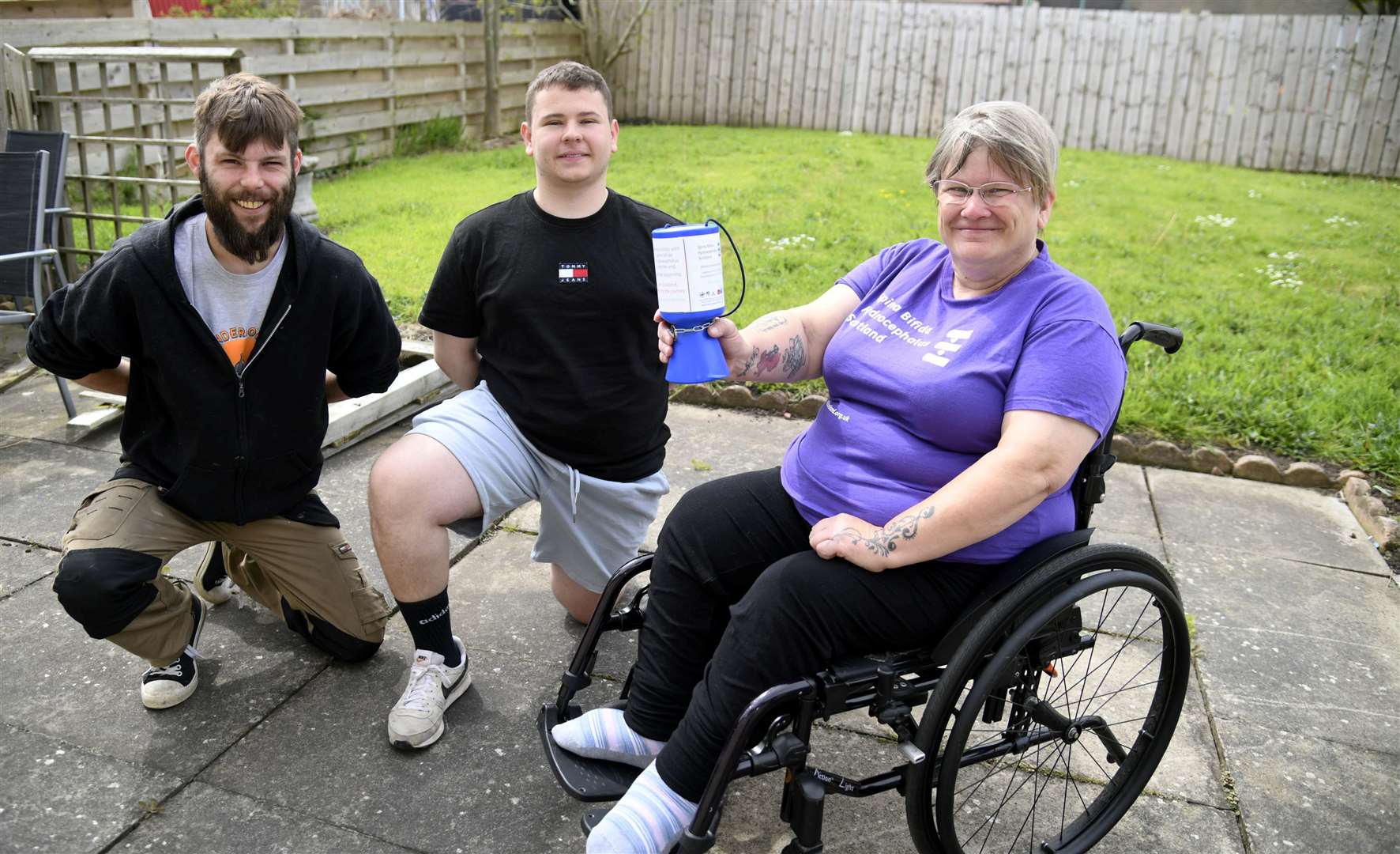 Sharon Mottram along with son Hayden Mottram (right) and friend Nathan Fieldhouse (left) completed a challenge where she pushed herself 177 miles in her wheelchair to raise funds for charity. Picture: Becky Saunderson