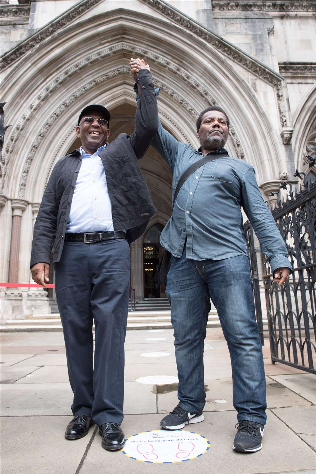 Paul Green and Cleveland Davidson outside the Royal Courts of Justice in London (Stefan Rousseau/PA)