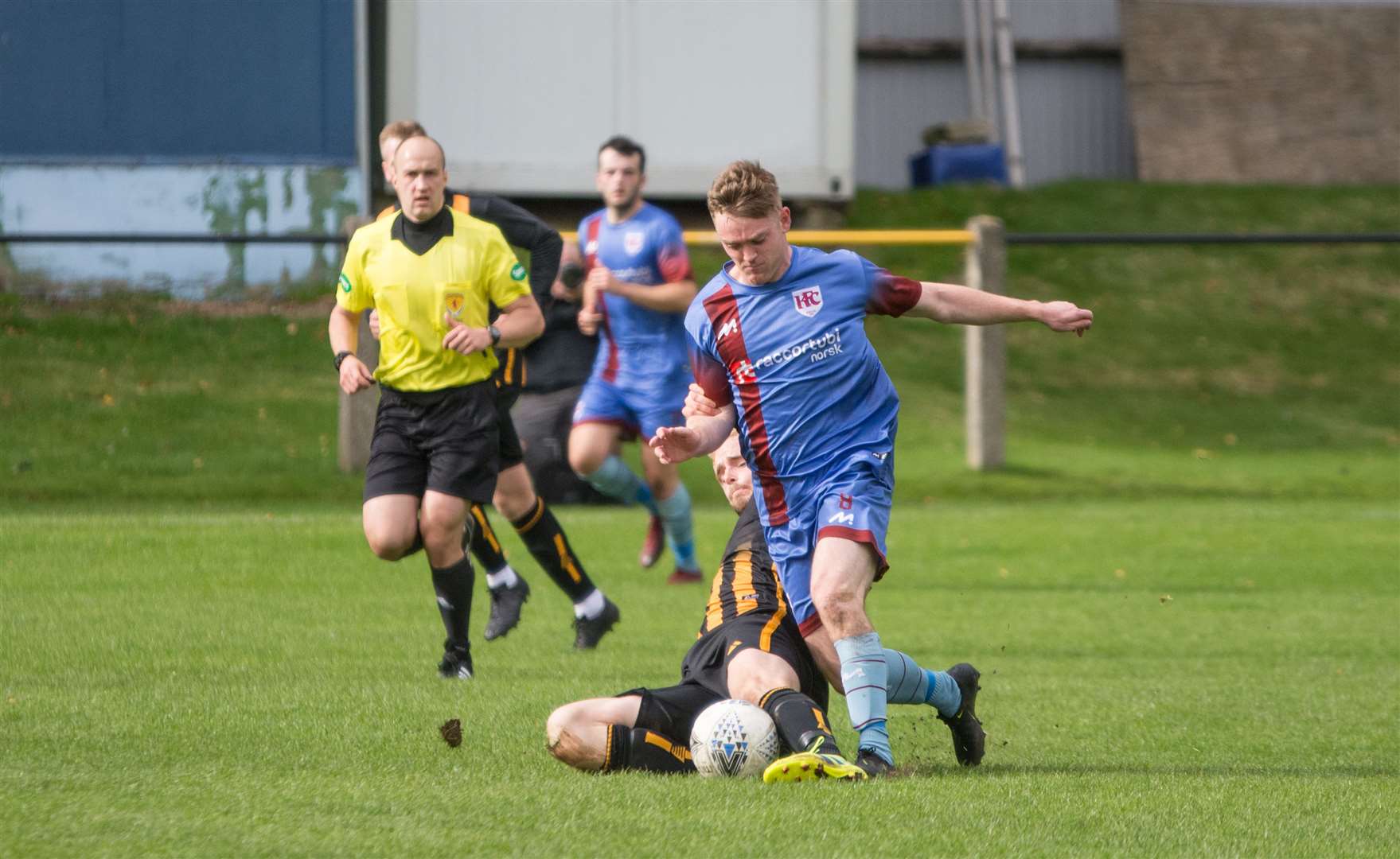Huntlys Ross Still slides in on Keiths Grant Thomson..Huntly (2) v Keith (2) at Chrisite Park, Huntly...Picture: Becky Saunderson..