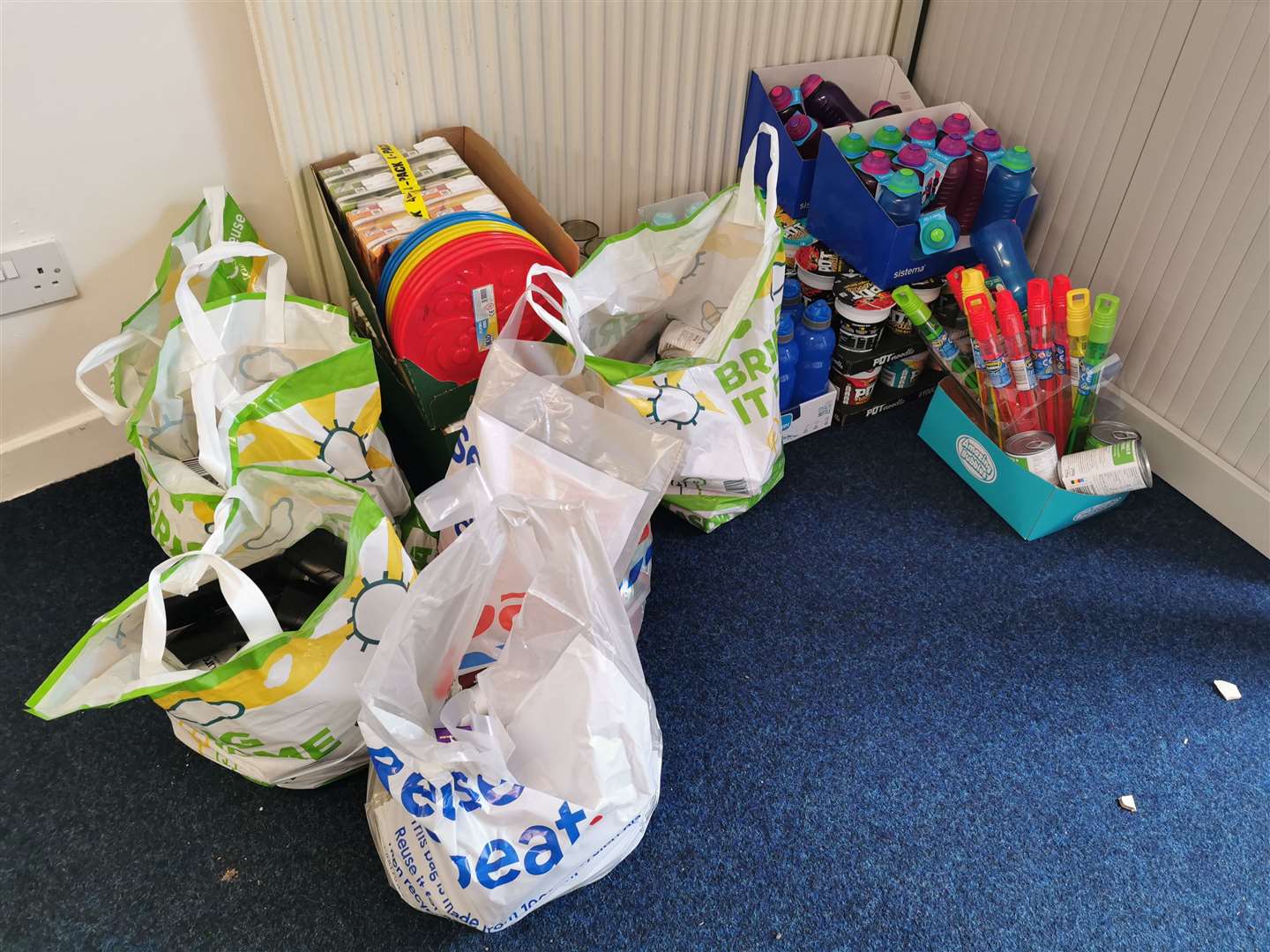 Six carrier bags filled with supplies were handed over to the food bank.