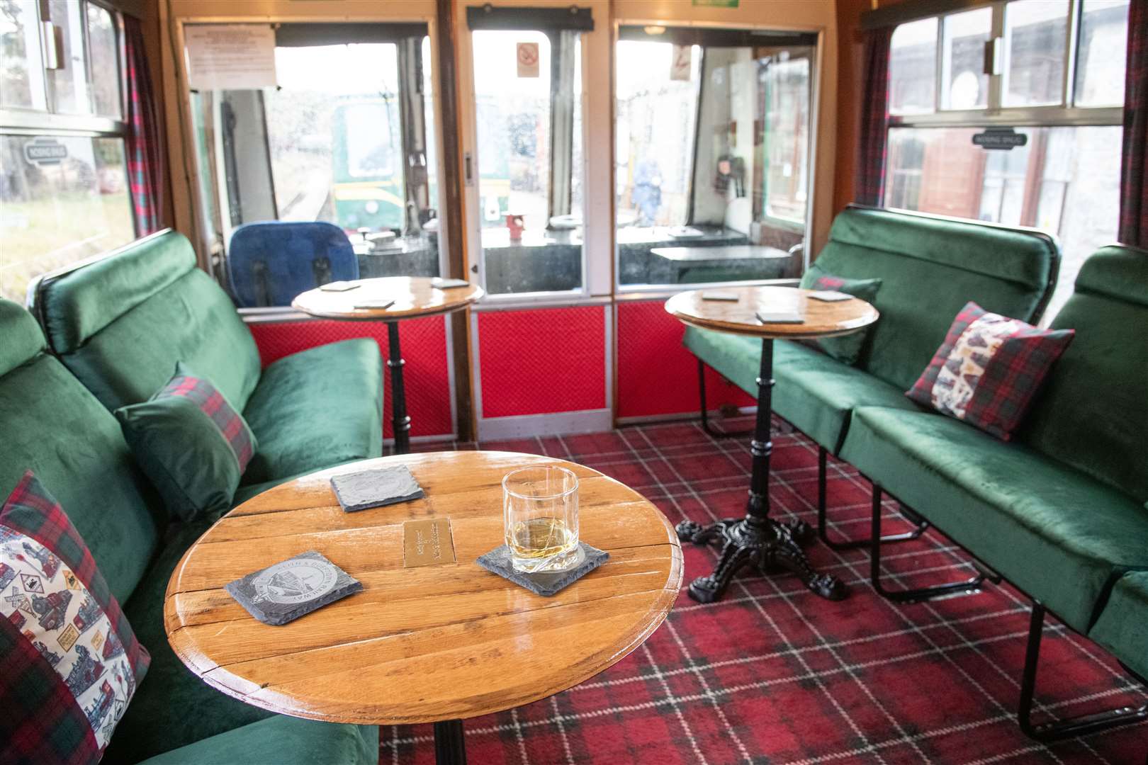 The interior stays true to the railway's history as the Whisky line, with tartan carpets and curtains and furniture made with Whisky casks from Speyside Cooperage. Picture: Daniel Forsyth