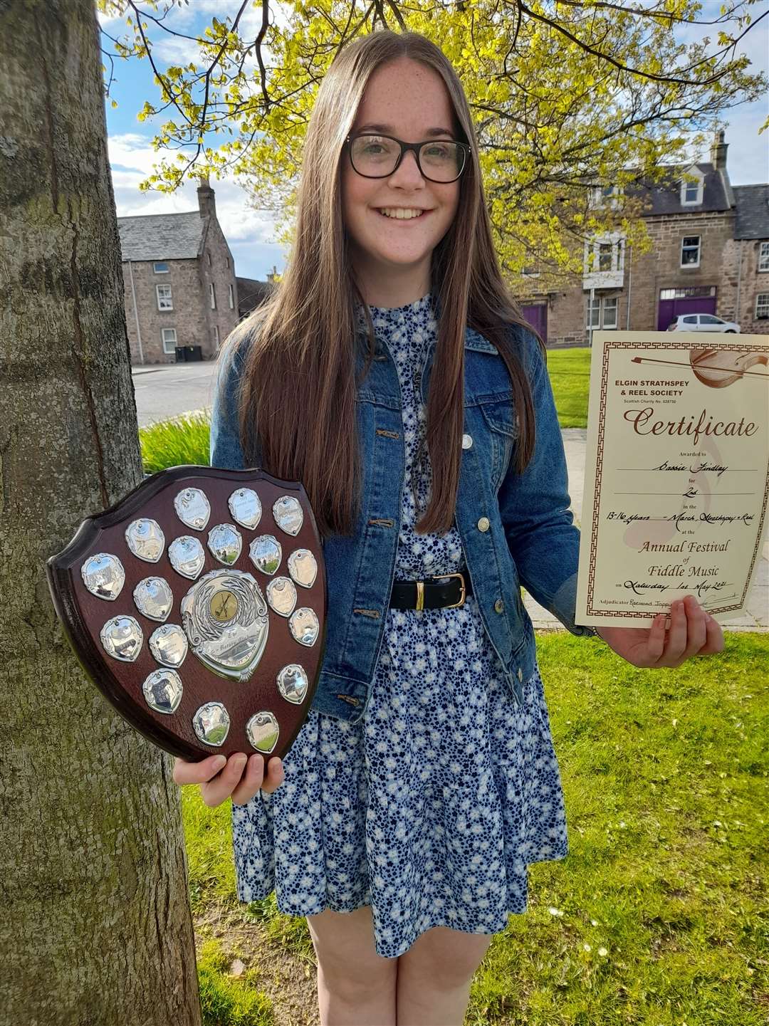 Cassie Findlay, from Grange, with the Rotary Club Shield and bow.