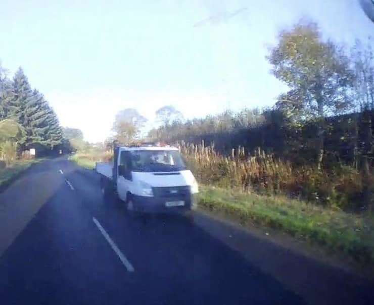 Dashcam images show the vehicle carrying ladders that collieded with the school bus