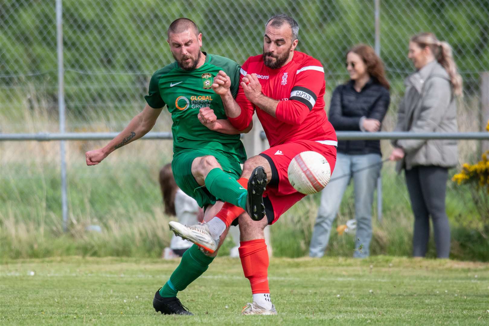 Dufftown's Michael Dunn and Forres' Matthew Davidson clash. Picture: Daniel Forsyth