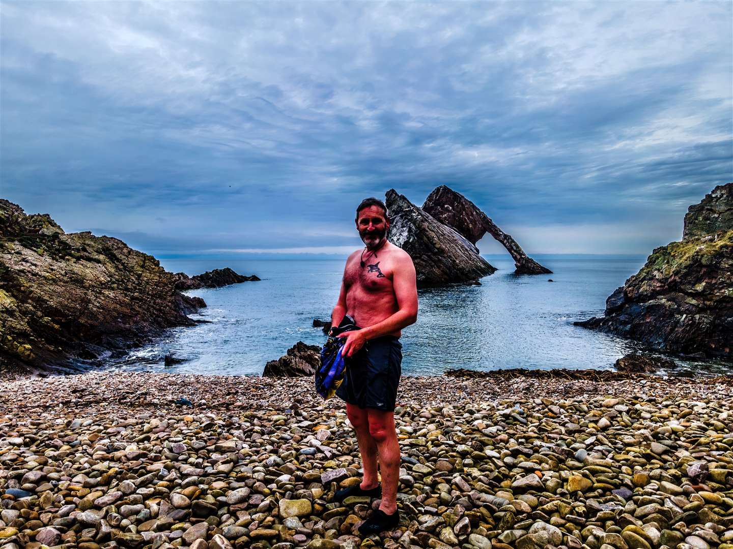 Cam Cameron gets ready to begin his swim round the Bow Fiddle Rock. Picture: Cam Cameron