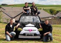 The group with the Vauxhall Corsa they have turned into a ‘cat’ to take part in the Ramshackle Rally Valencia. From left are Josh Whitehouse, Ross Raffan, James Ewan and Richard Earsman. (AR)